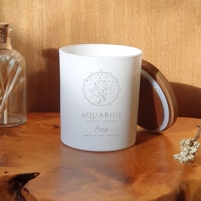 Birthday zodiac design on a white candle jar