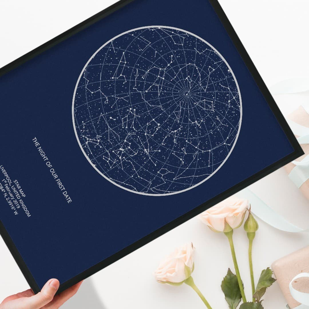 Navy night sky print in a black frame
