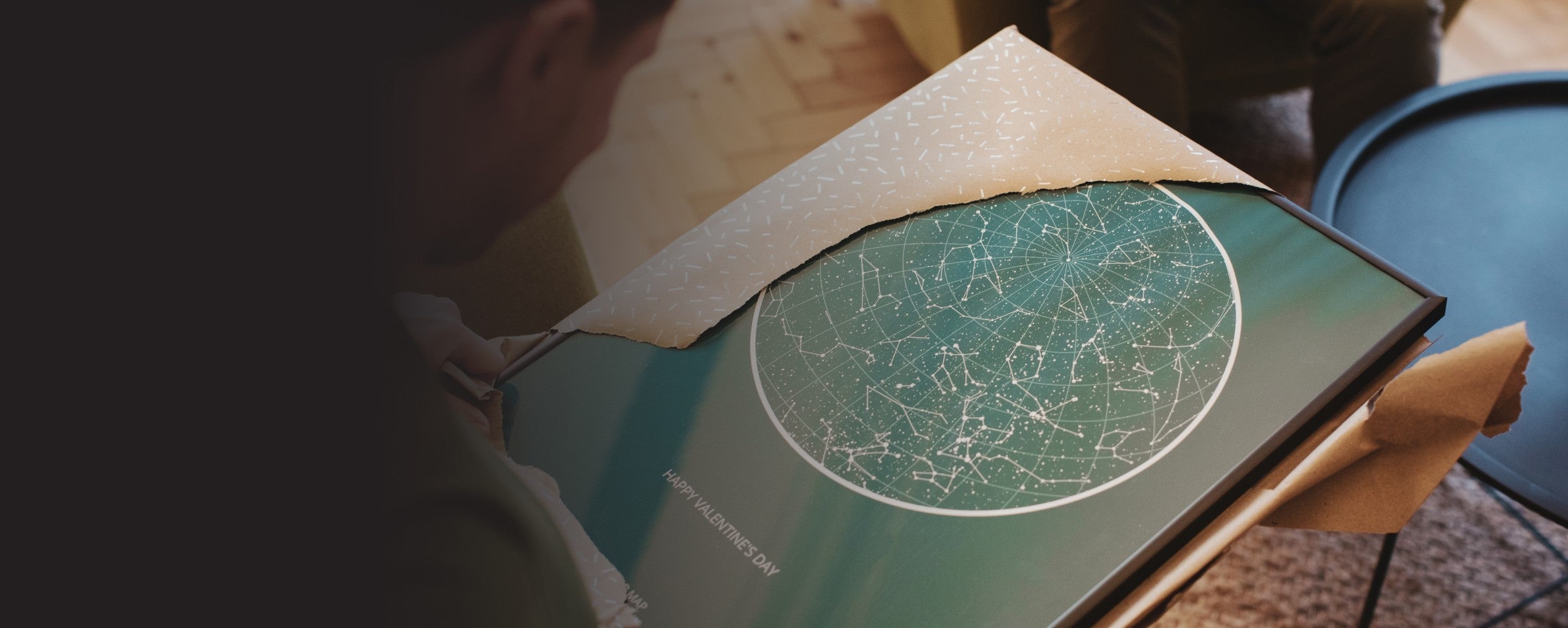 Framed star map print on a table