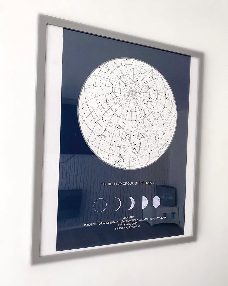 Navy star map with moon phases in a silver frame