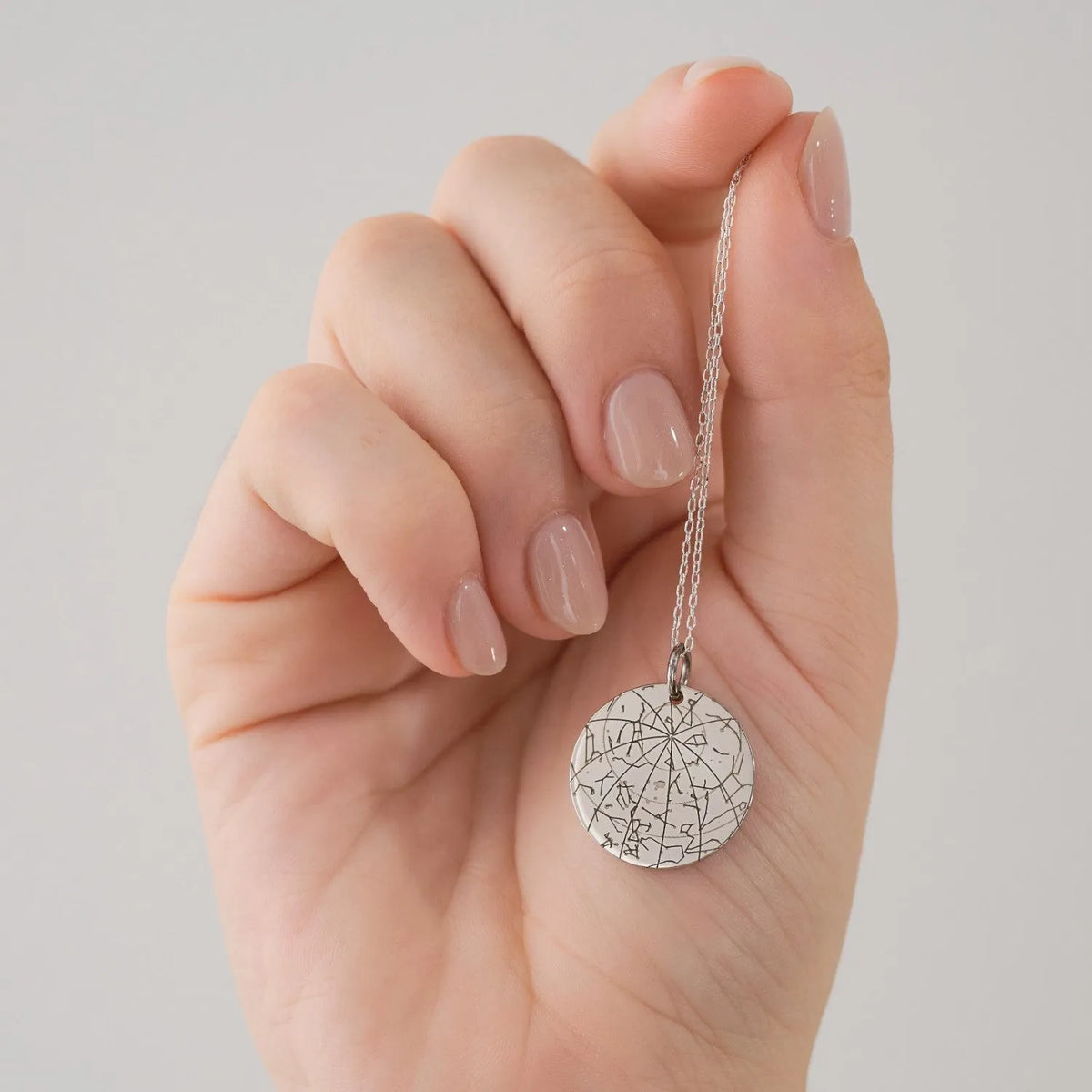 Engraved star map pendant