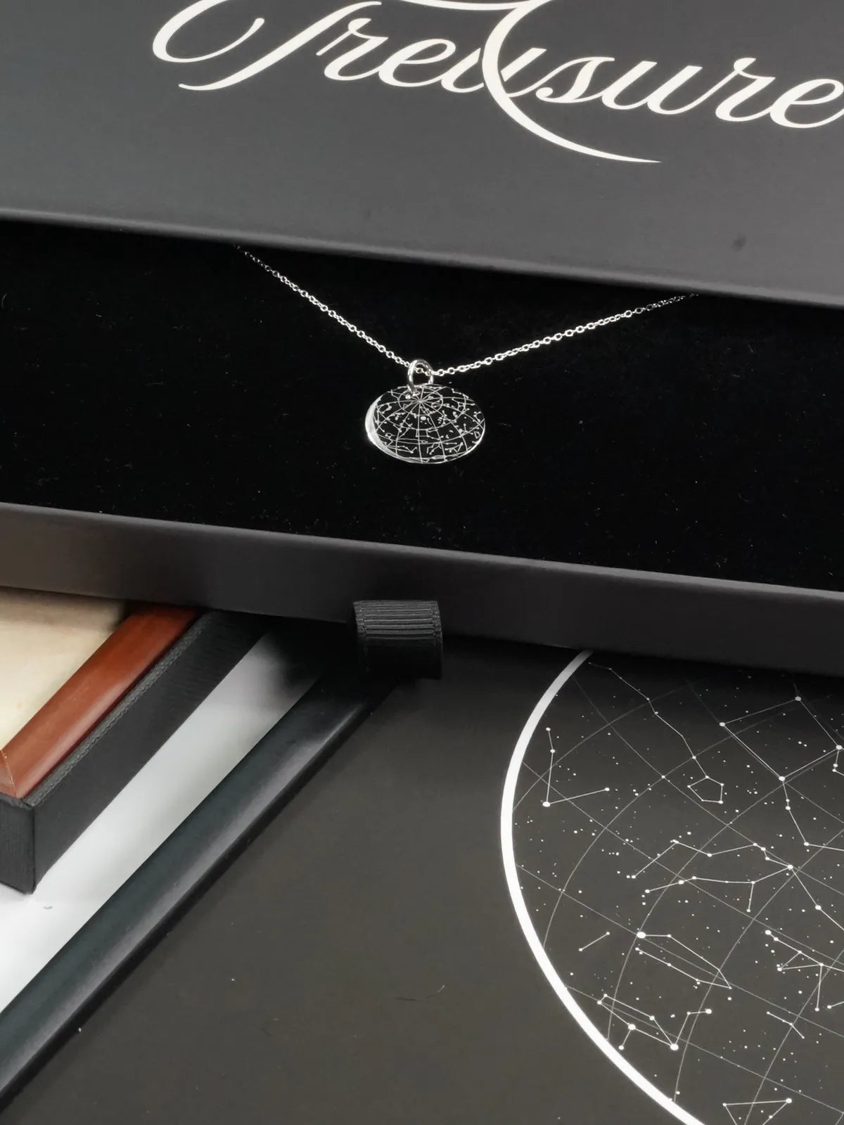 Silver star map pendant in its gift box, ready to wrap for Christmas