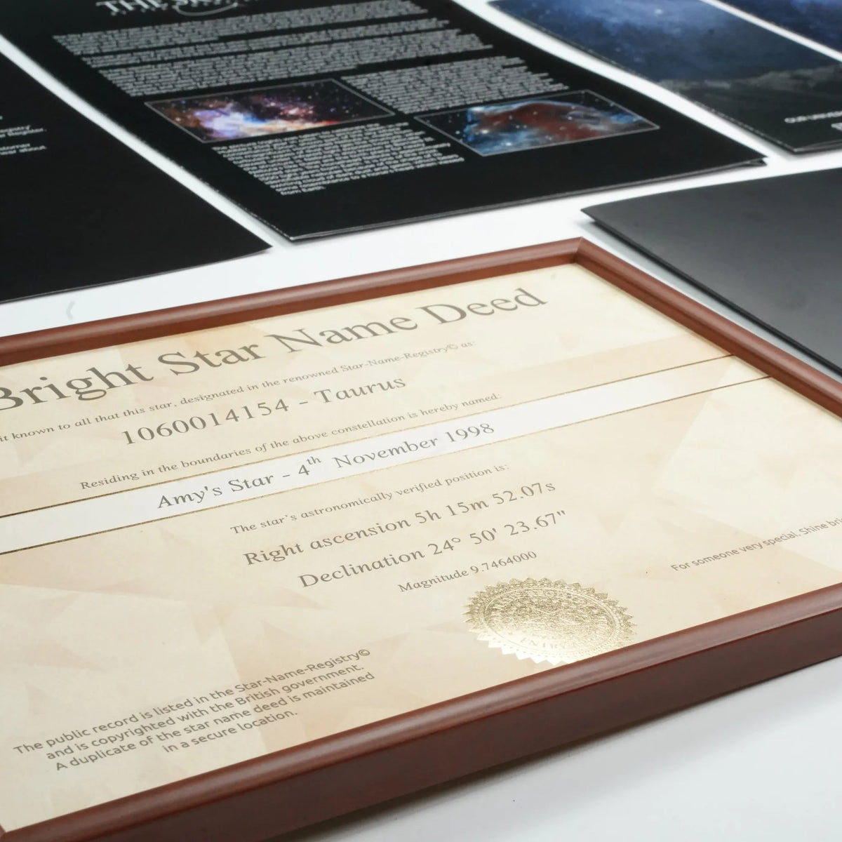 Close-up of the gold seal on a star name certificate