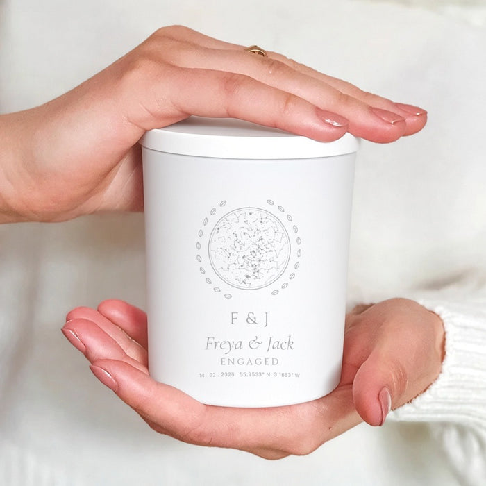 Engagement initials design candle held in hands