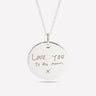Silver pendant engraved with handwriting