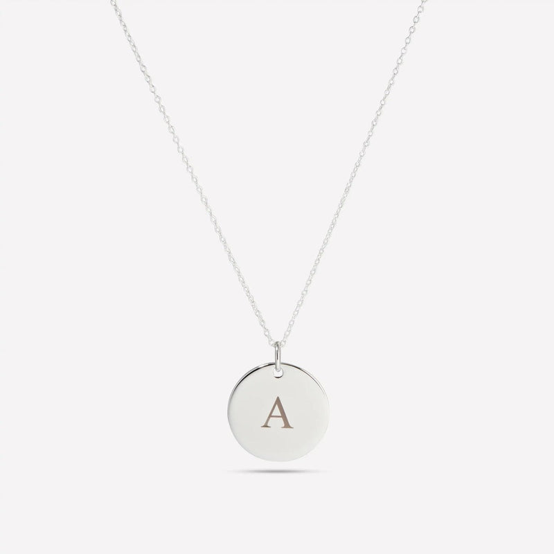 Silver pendant engraved with the letter A