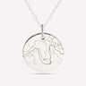 Silver pendant engraved with a street map