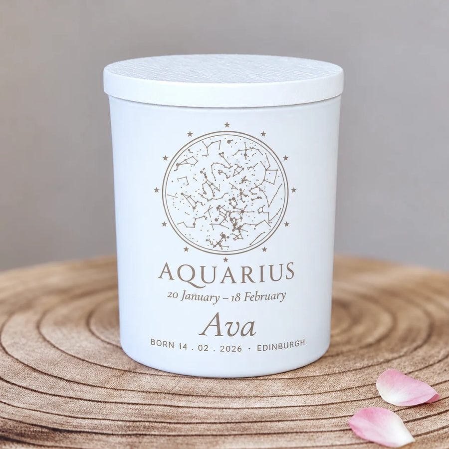 Personalised birthday candle engraved with a zodiac star map and a name