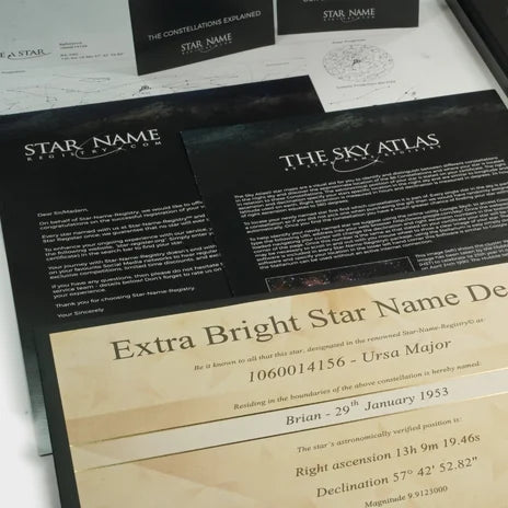 Star certificate with a sky atlas and a handwritten-style letter