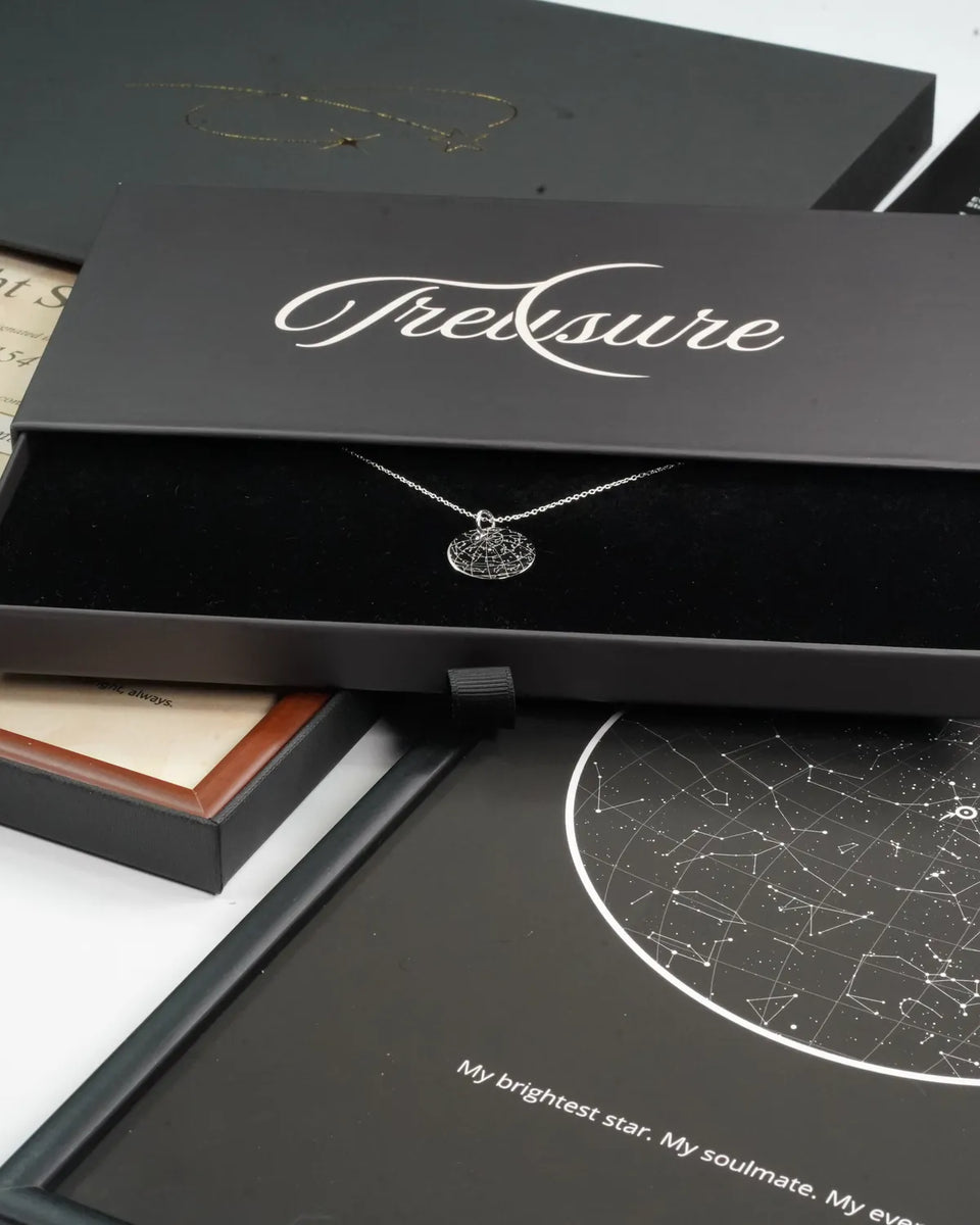 Silver star pendant in its gift box